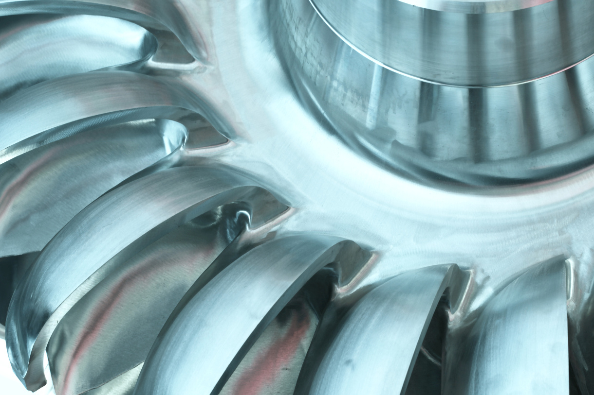 Close up photo of the blades of a hydroelectric turbine